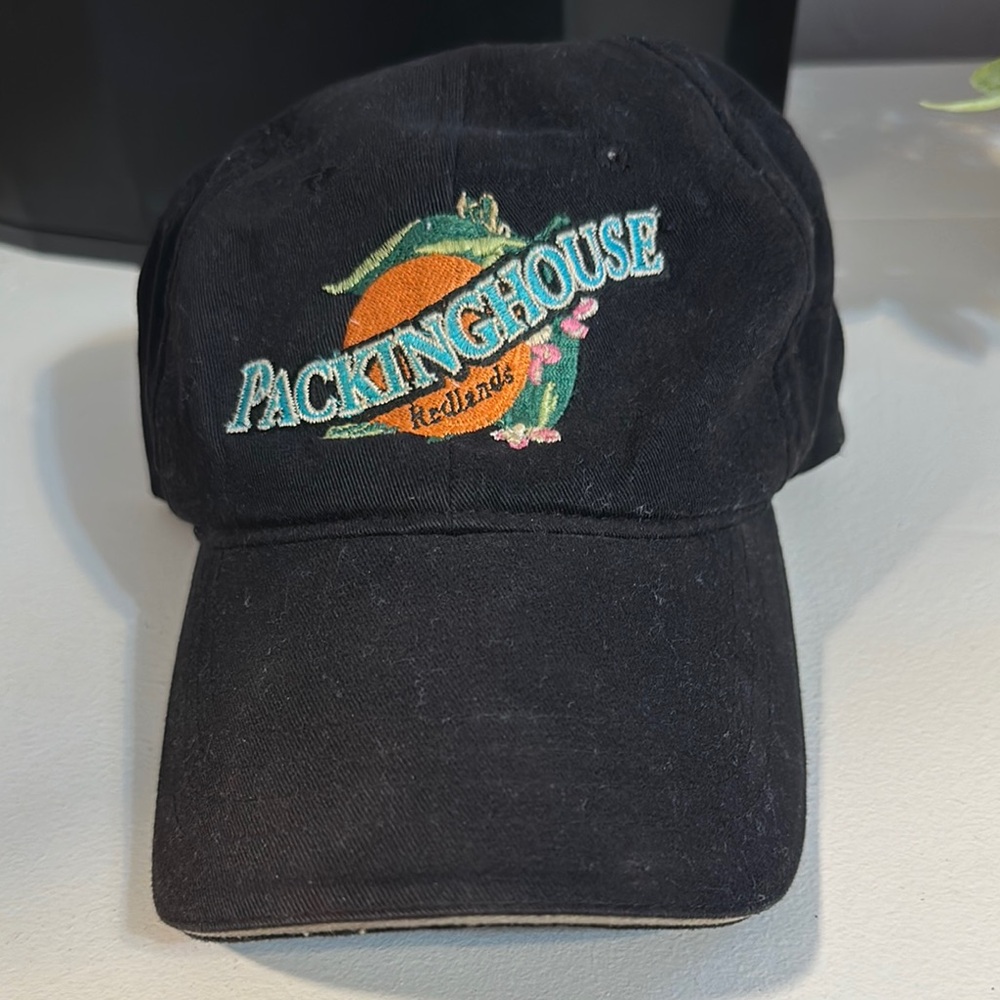 Redlands Packing House black cotton ball cap. Adjustable so it’s OS.